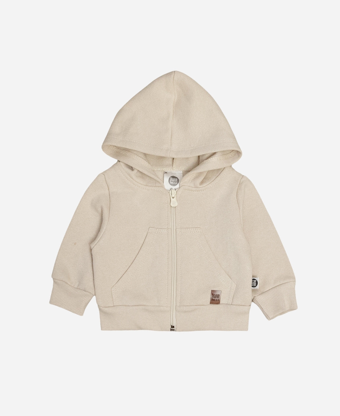 Casaco Moletom Peluciado Liso Beige MiniMalista Baby — vista frontal do casaco infantil unissex em bege claro neutro. 100% algodão antialérgico, capuz peluciado sem cordinha, zíper com cobre-zíper interno. Corte folgado pra usar sobre body canelado. Do bebê de 0-3 meses à criança de 5-6 anos.